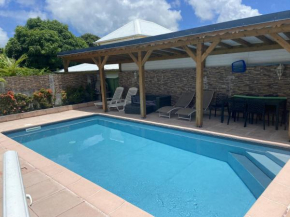 Maison de 3 chambres avec piscine partagee jardin clos et wifi a Sainte Anne a 8 km de la plage